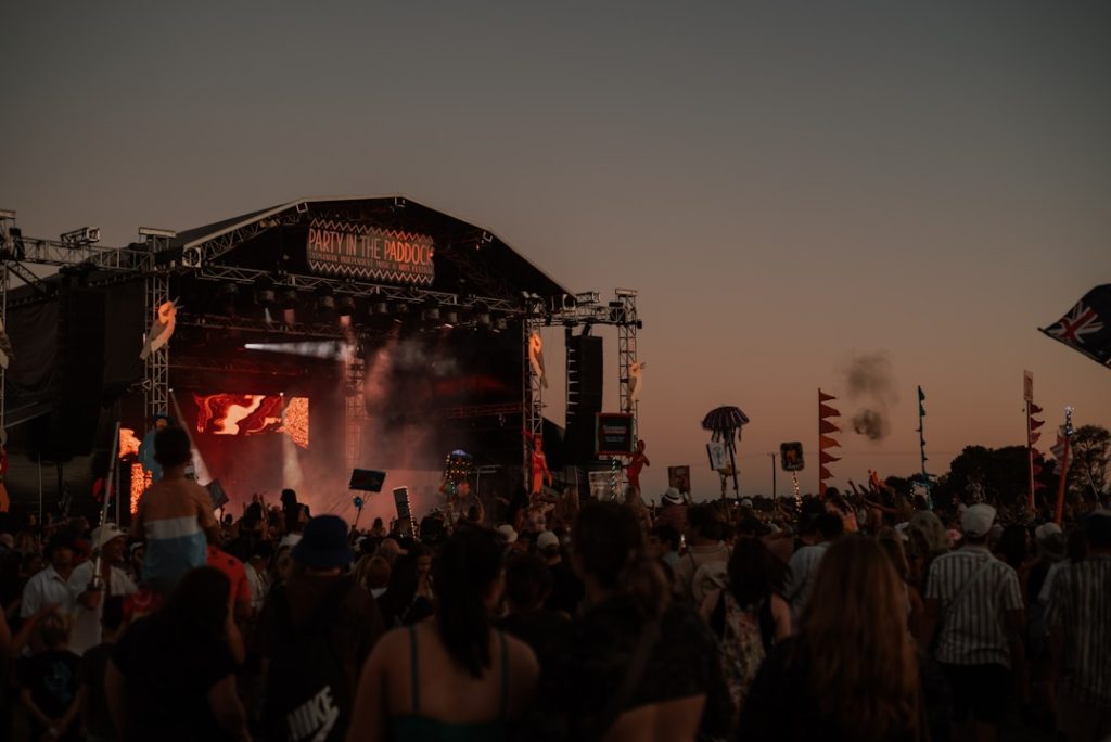 Music Arrangement Pro Tips for a Finished Track in 60 Minutes 2 Festival crowd silhouette showing the energy goal behind music arrangement tips
