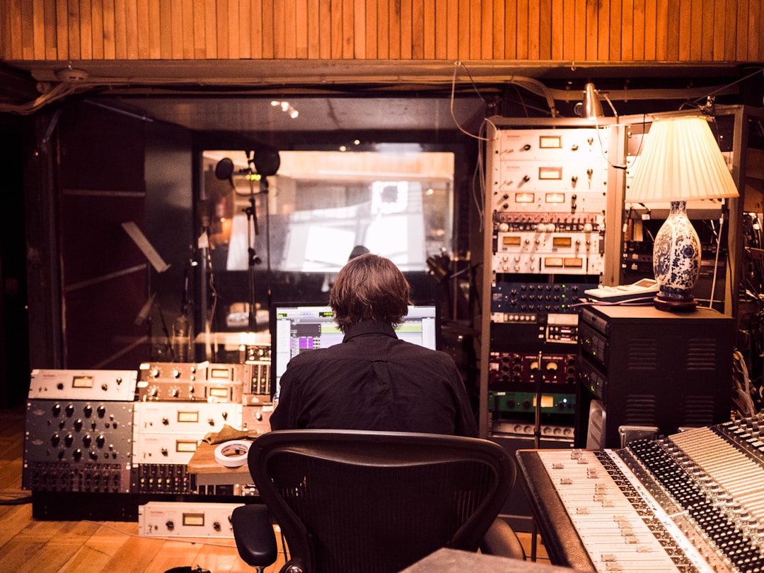 Blog 2 High-end studio interior set up for music production with monitors, rack gear and golden-hour light