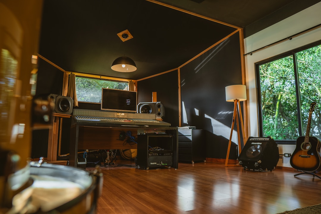 Blog 6 Architectural studio interior for an exclusive music purchase session with monitors, rack gear and golden-hour light